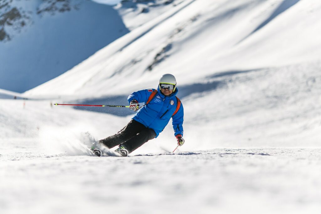 a person skiing down the mountain