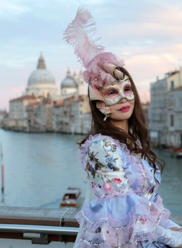 a woman wearing a mask during the Venice Carnival