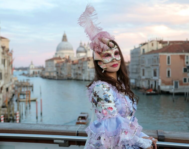 a woman wearing a mask during the Venice Carnival